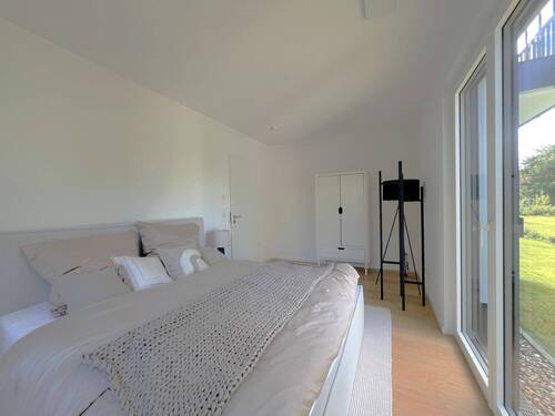 gemütliches Schlafzimmer - Terrassenwohnung mit 88,00 m&sup2; in München zum Kaufen