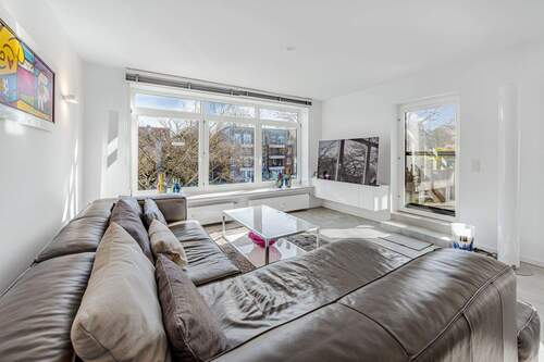 Lichtdurchfluteter Wohnbereich mit Terrassenausgang - 4 Zimmer Etagenwohnung in Bochum