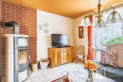 Wohnzimmer mit Kaminofen - 