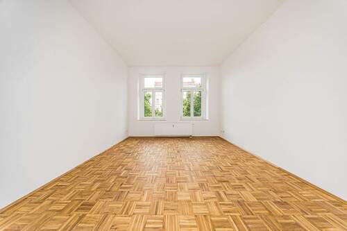 Wohnzimmer - Renovierte Altbauwohnung mit Tageslichtbad und harmonischem Grundriss