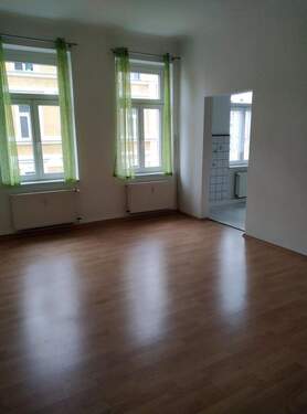 10-Wohnzimmer mit Blick zur Küche.jpeg - 