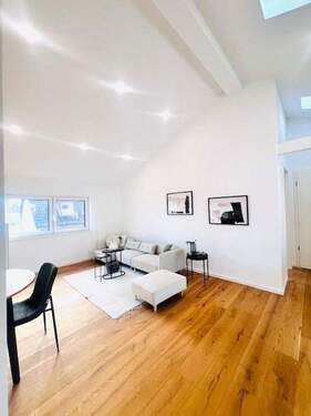 Wohnzimmer - Modernes Wohnerlebnis in Mainz - kernsanierte 3-Zimmer-Wohnung mit gehobener Bauausstattung