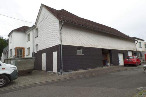 Seitenansicht - Einfamilienhaus mit 242,00 m&sup2; in Oberdreis zum Kaufen