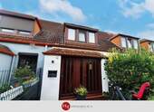 Haus kaufen in Bremen – H & T Immobilien - Gemütliches Reihenhaus mit Südwest-Terrasse und Garage!