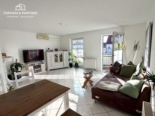 Wohnzimmer - 3-Zimmer-Maisonettewohnung mit Südbalkon