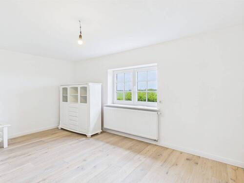 Wohnzimmer - Reihenendhaus mit 102,00 m&sup2; in Nordstrand zum Kaufen