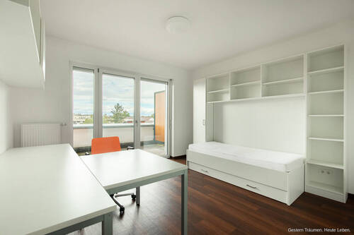Schlafzimmer - Modernes 1-Zimmer-Apartment mit großer Dachterrasse und Tiefgaragenstellplatz