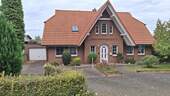 Ansicht - Gepflegtes Einfamilienhaus mit Einliegerwohnung, Garage und Carport in 19089 Göhren