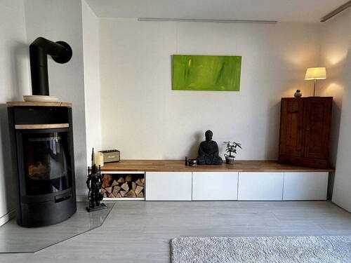 Wohnzimmer mit Holzofen - 