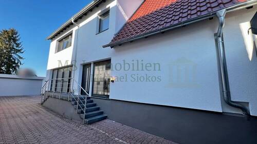 Einfahrt Ansicht 1 - 6 Zimmer Einfamilienhaus zum Kaufen in Lampertheim