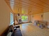 Wohnzimmer - 5 Zimmer Einfamilienhaus zum Kaufen in Ihlow