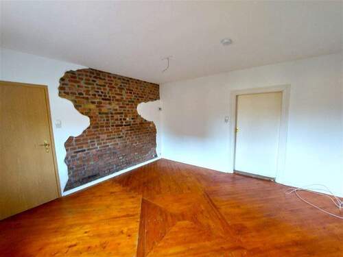 Wohnzimmer - Mehrfamilienhaus, Wohnhaus mit 100,00 m&sup2; in Mansfeld zum Kaufen