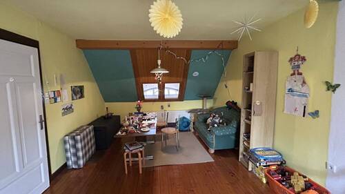 Zimmer im Dachgeschoss - 