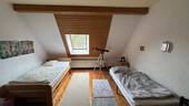Zimmer im Dachgeschoss - 