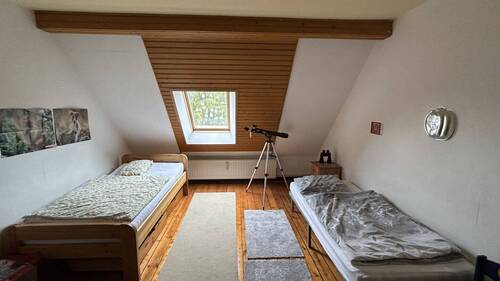 Zimmer im Dachgeschoss - 