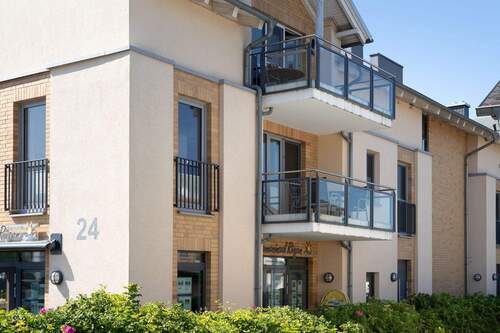 Die idyllischen Balkone mit Sonnenaufgangsgarantie - Etagenwohnung mit 68,90 m² in Glowe zum Kaufen