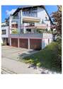 Außenansicht Wohnung / Garage - 4 Zimmer Etagenwohnung zum Kaufen in Biberach