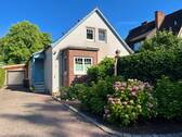Ansicht - Charmantes Einfamilienhaus mit wunderschönem Garten - Ideal für Familie & Homeoffice