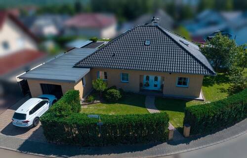 Bild 1 - Charmanter Bungalow in ruhiger Lage: Wohnen wie im Urlaub