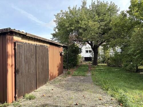 Außenansicht - Hier wird Ihr Wohntraum wahr: Idyllisches Grundstück mit einem sanierungsbedürftigem Bungalow