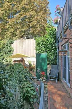 Terrasse an der Rückseite der Wohnung - 