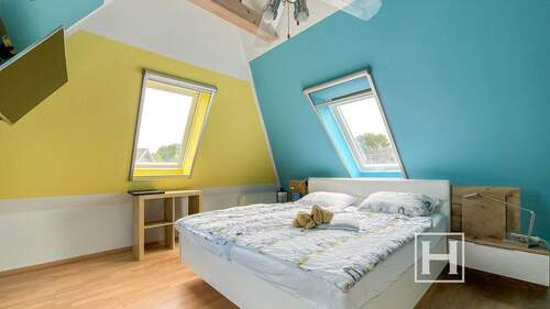 Schlafzimmer im Dachgeschoss - 