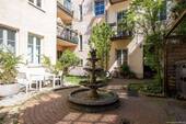 Innenhof mit Brunnen - 4 Zimmer Etagenwohnung in München
