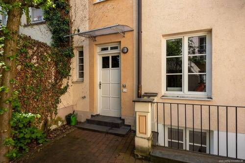 Hauseingang - Etagenwohnung mit 116,00 m&sup2; in München zum Kaufen