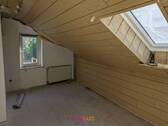Zimmer im Dachgeschoss - 