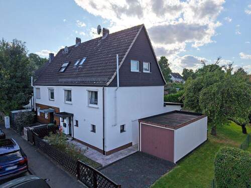 4045 - Straßenansicht - 4 Zimmer Doppelhaushälfte zum Kaufen in Kassel