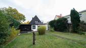 Garten und Hinteransicht Haus - 