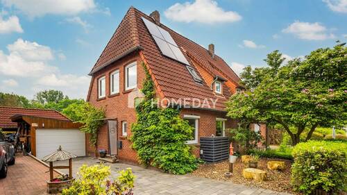Außenansicht 2 - Familienfreundliche Doppelhaushälfte mit Wintergarten und Garage