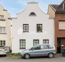 Raumwunder in Düsseldorf-Hamm: Gepflegtes EFH mit idyllischem Garten und vielseitigem Nebenhaus