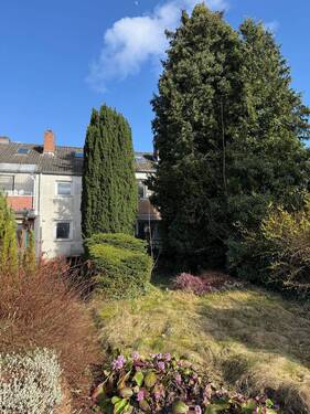 Gebäuderückseite - Reihenmittelhaus mit 100,00 m&sup2; in Norderstedt zum Kaufen