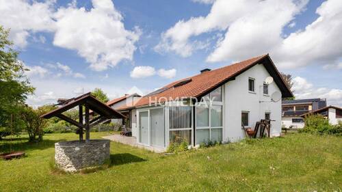 Außenansicht 2 - Wohnen mit Wohlfühlcharakter - gepflegtes Einfamilienhaus mit Wintergarten und großem Gartenparadies