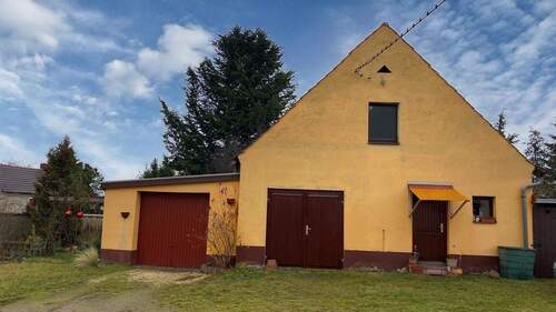 Nebengebäude mit Garage - Einfamilienhaus mit 183,80 m&sup2; in Belgern zum Kaufen