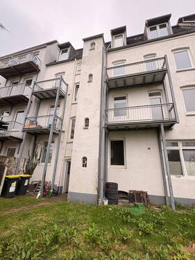Rückfassade mit Balkonen - Mehrfamilienhaus, Wohnhaus in Flensburg zum Kaufen