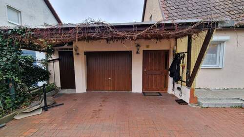  Garage - Einfamilienhaus mit 105,00 m&sup2; in Berlin zum Kaufen