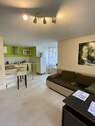 Wohn-Küchenbereich - Charmante und helle 2-Zimmer-Souterrain-Wohnung