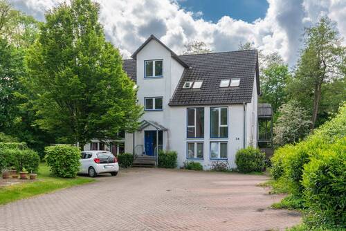 Außenansicht - Mehrfamilienhaus, Wohnhaus zum Kaufen in Fintel