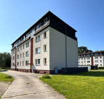 Familienfreundliche Eigentumswohnung mit Einbauküche, 2x Balkonen und 2x Garagen in Löberitz - Zörbig / Löberitz