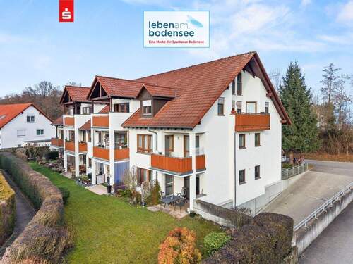 Hausansicht Gartenseite - Wohnen auf zwei Ebenen: Charmante Maisonette mit Galerie