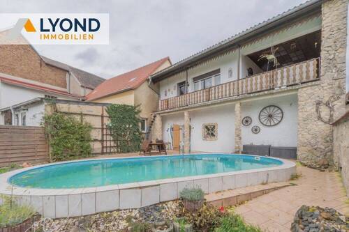 Haus Gartenseite - 7 Zimmer Mehrfamilienhaus, Wohnhaus zum Kaufen in Lützen