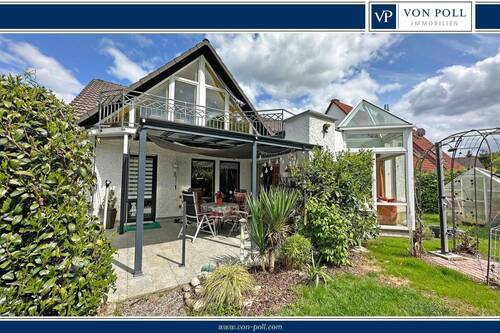 Titelbild - Charmant, ruhig, naturnah - Gemütliches Einfamilienhaus mit lichtdurchflutetem Wintergarten