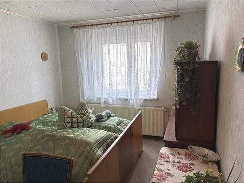 Schlafzimmer Nebengebäude mit Gästewohnung - 