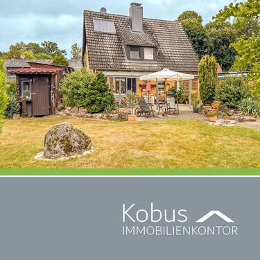 Titelbild - Einfamilienhaus mit kunstvollem Garten