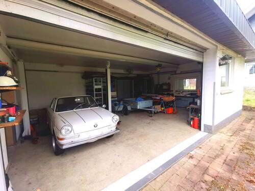 Garage mit Werkstatt - Mehrfamilienhaus, Wohnhaus in Derschen zum Kaufen