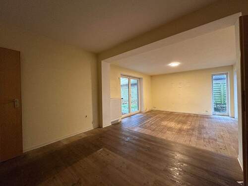 Wohnzimmer - Doppelhaushälfte mit 85,00 m&sup2; in Schafflund zum Kaufen