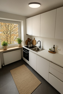 Einbauküche mit Blick ins Grüne - 3 Zimmer Etagenwohnung in München / Untermenzing