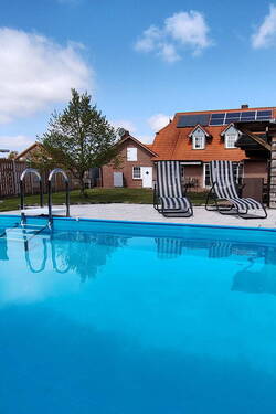 Blick vom Außenpool - Einfamilienhaus mit 165,00 m&sup2; in Buchholz/Aller zum Kaufen